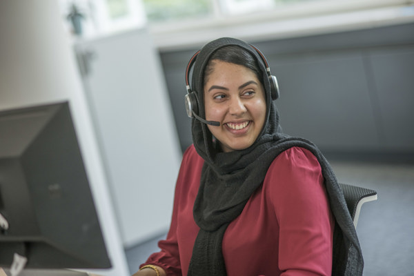 Smiling Lady In Accent Call Centre